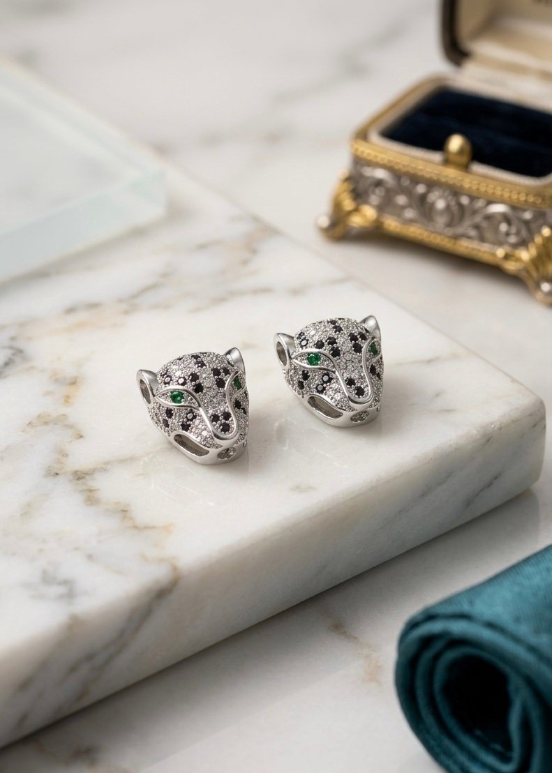 PENDIENTES DE BOTÓN
 PUMA SILVER